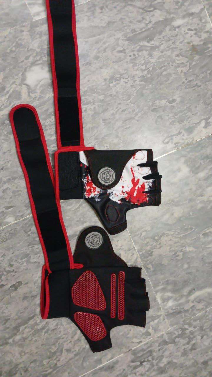 black and red weightlifting gloves with wrist support straps and silicone grip pads for gym workouts