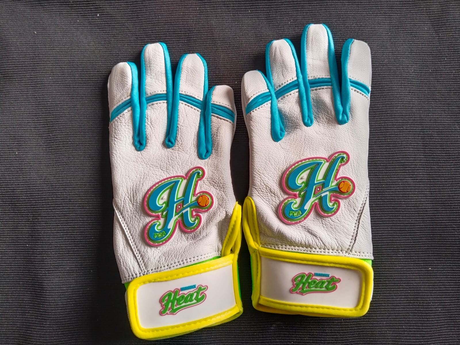 Brunswick Heat custom baseball softball glove with leather front and neoprene cuff designed for durability and comfort