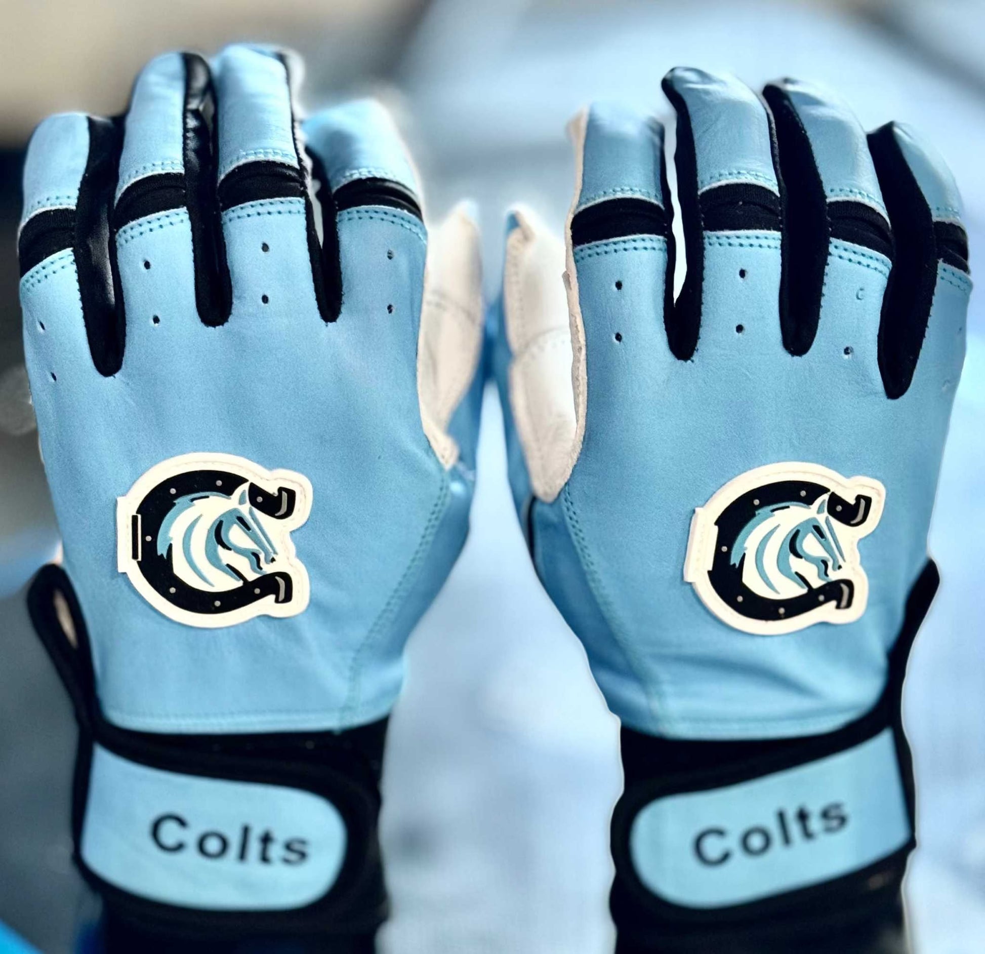 Custom baseball and softball gloves with leather front, neoprene cuff, sublimation back, and reinforced stitching for durability and comfort